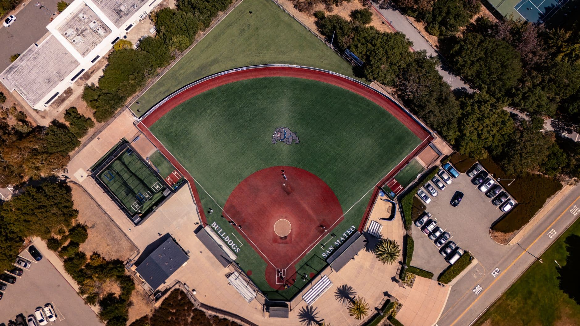 Aerial shot of a baseball field in San Mateo, California, showcasing lush green surroundings.