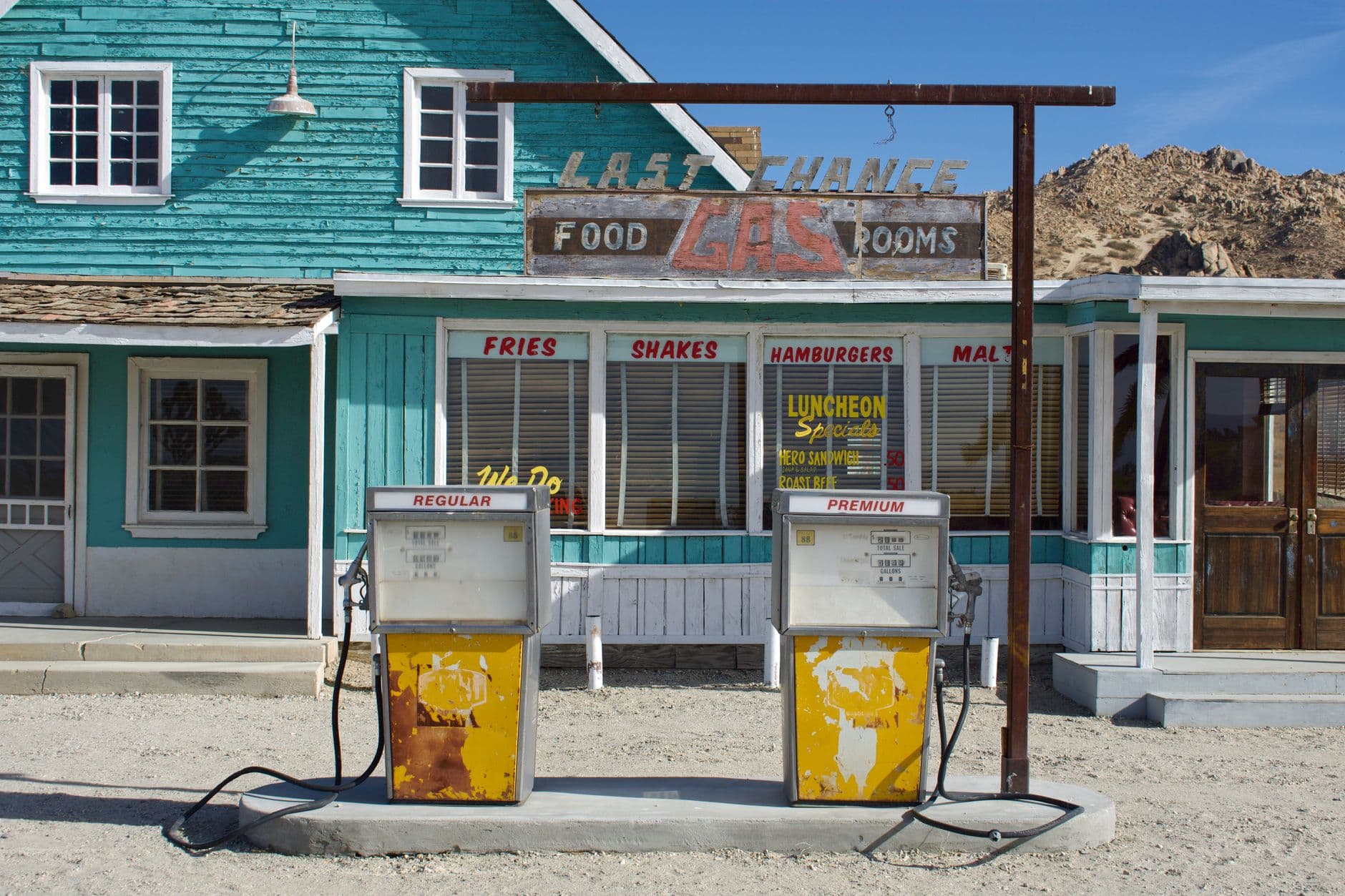 Retro gas station with classic pumps in Lancaster, CA, featuring rustic architecture.