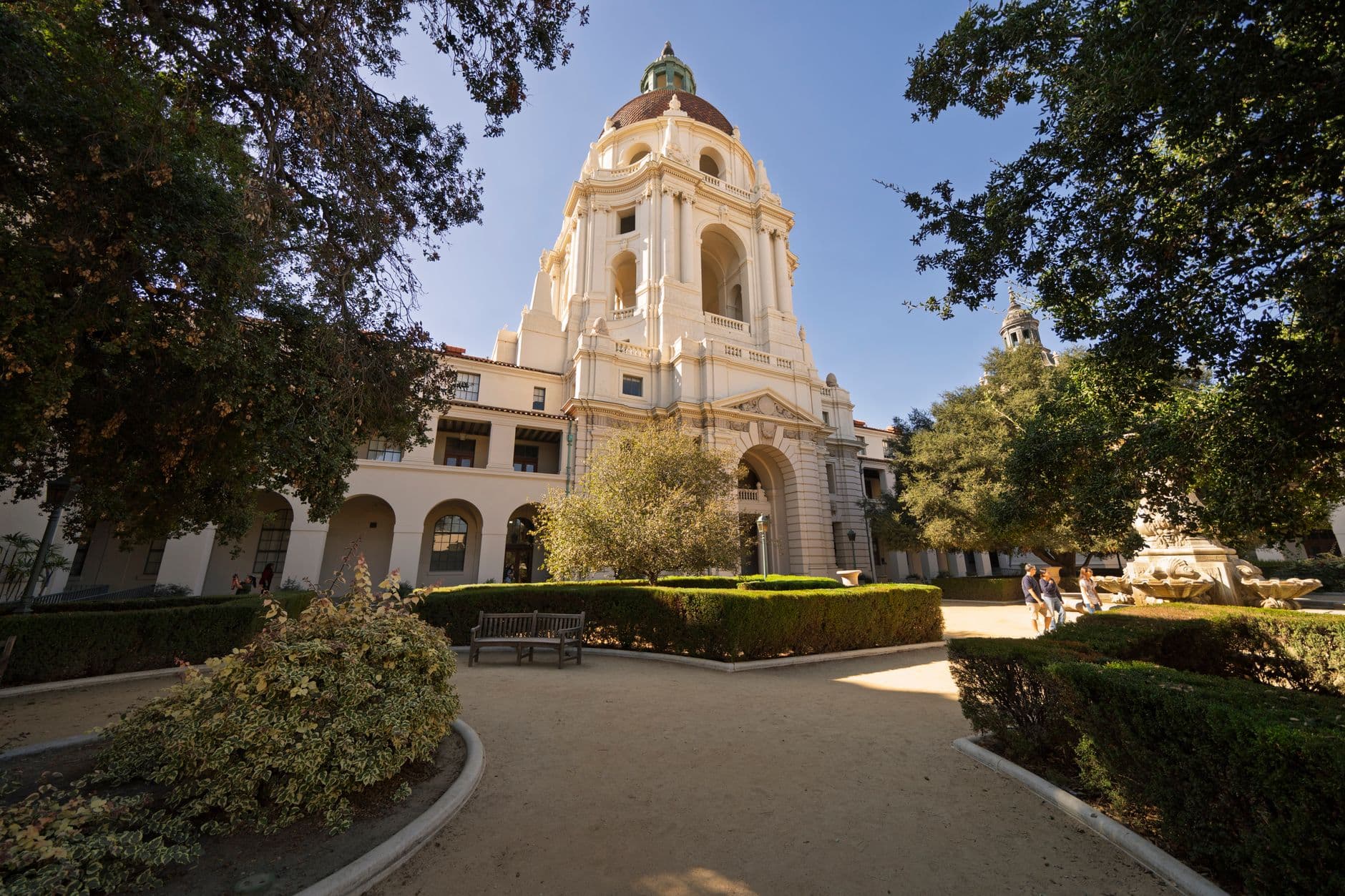 Elegant view of Pasadena City Hall with lush gardens on a sunny day.